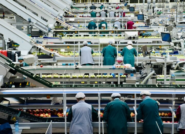 a group of men in a factory